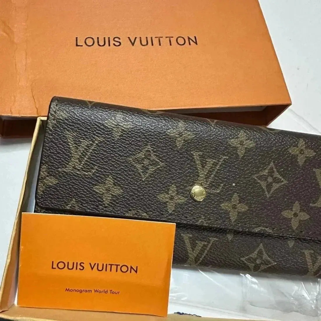 Authentic Louis Vuitton Portefeuille Sarah Long Wallet - Monogram Canvas NORTH WAVE   SCENTORA
